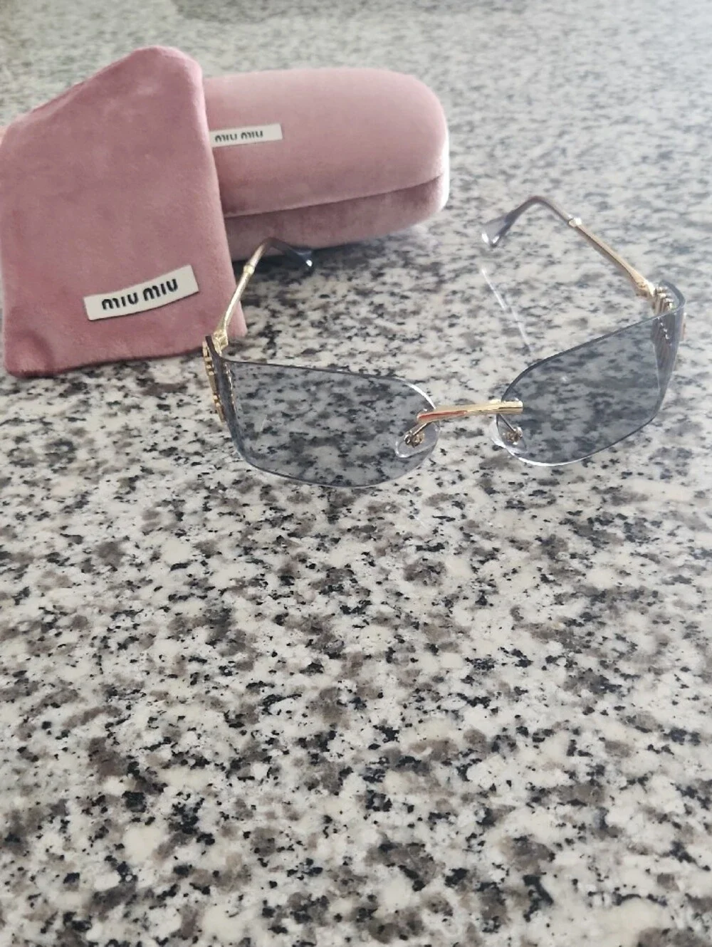 Miu Miu Gold and Black Rimless Sunglasses with Pink Velvet Case